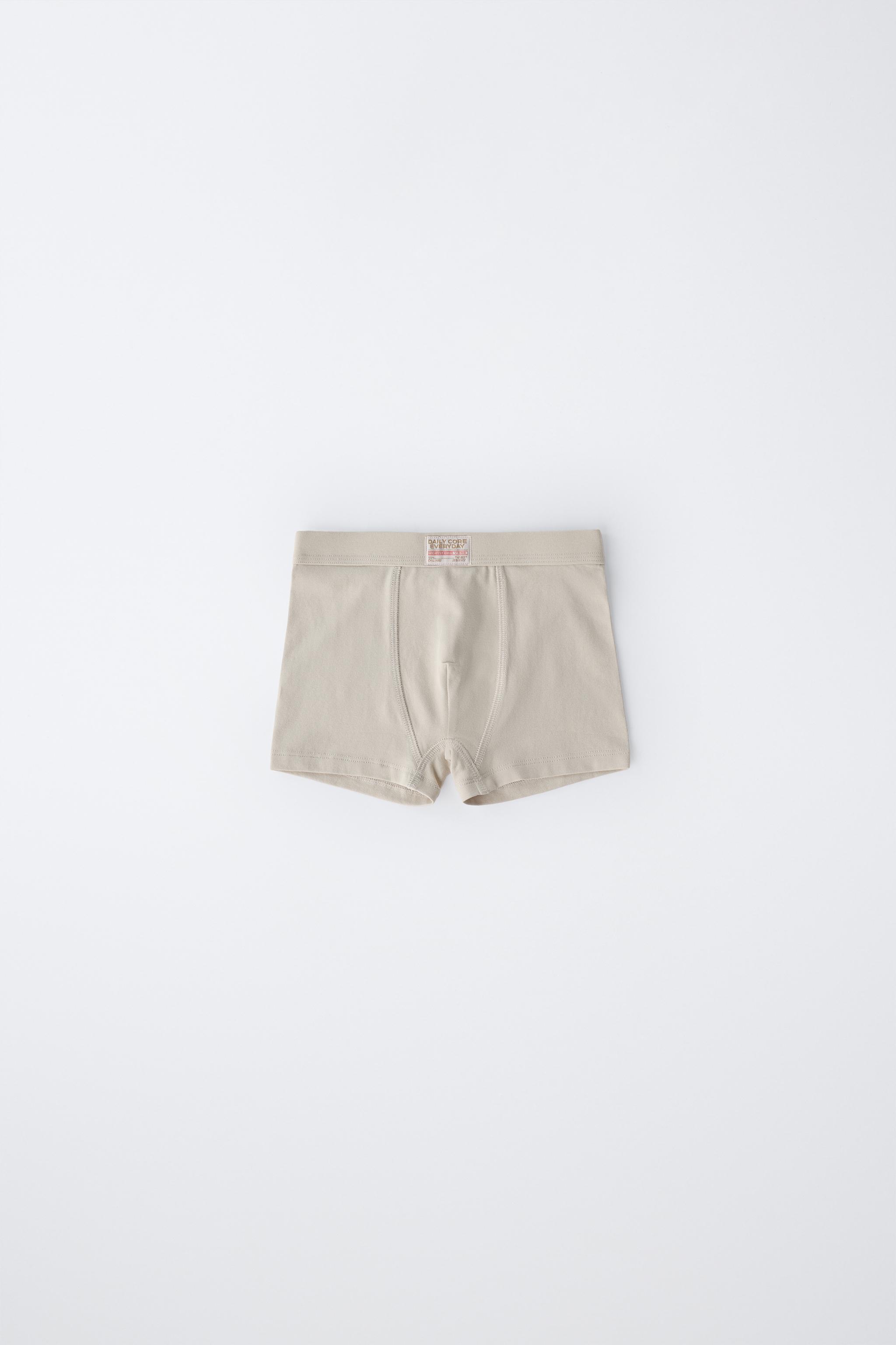 PACK DE CINQ BOXERS ÉTIQUETTE (6-14 ANS)